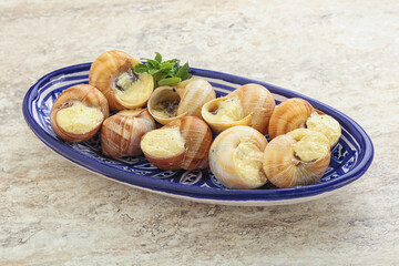 Delicous baked snail with butter - Escargot
