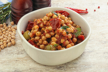 Chickpea beans with dry tomato and olives