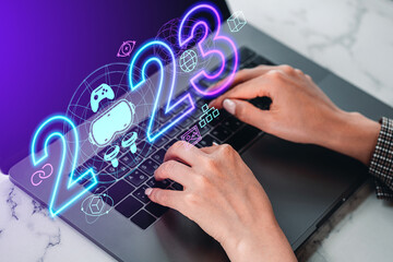 Businesswoman hands typing on laptop, 2023 year and vr accessories