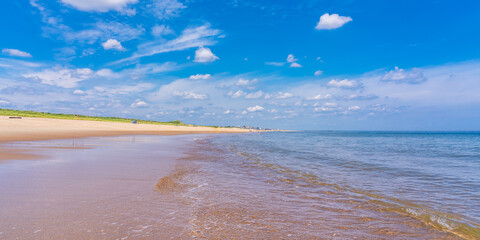 Breakdown of a wave on the beach of the Atlantic Ocean in Massachusetts on Plum Island