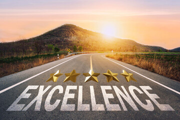 Five stars,excellence written on highway road in the middle of empty asphalt road of asphalt road...