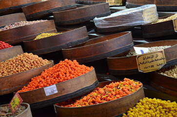 Photos of the colourful bazaar of Amman city full of spices, fruits, pomegranates, sweets and other...