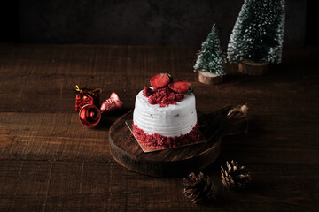a strawberry cake with christmas background