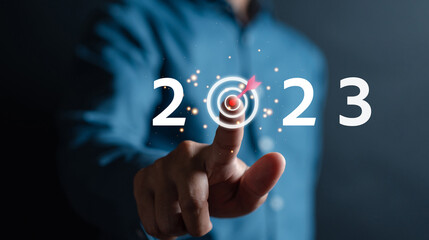 Businessman aiming 2023 new year business target planning development leadership and customer...