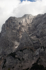 the rocky peaks  in the Triglav national park in Slovenia. The rocky peaks and clouds of Triglav National Park Slovenia.
