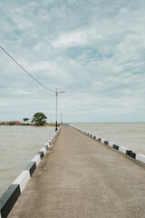 Fototapeta premium Perspective view of bridge at sea