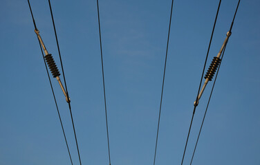 A spacer used to separate high voltage wires, held by a common corridor in the penetration of an...
