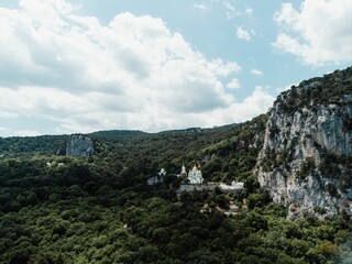 Christian church in the mountains above the sea. Temple of the Holy Archangel Michael in Oreanda. The southern coast of Crimea. Aerial view