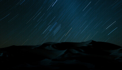 Star Trails Over Serene Desert Nightscape