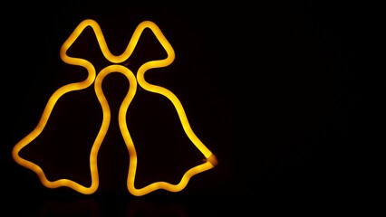 Obraz premium illuminated christmas bells on black background ,christmas decoration