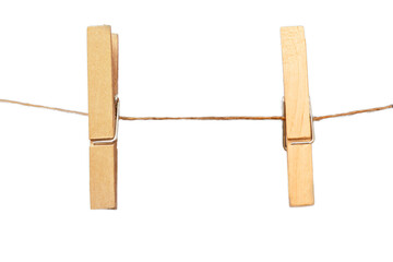 2 wooden clothespins on a rope, png file - obrazy, fototapety, plakaty