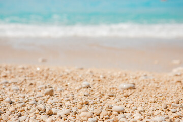 Fototapeta na wymiar sea beach with white rocks and blue water