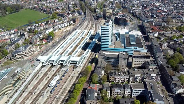 Aerial view of Arnhem central railway station also known as Arnhem-Centraal is a trainstation created by a famous architect the roof is referred to as the wokkel because of the shape 4k quality