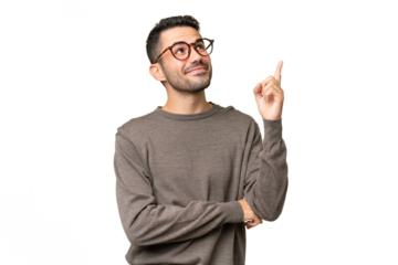 Young handsome caucasian man over isolated background pointing up a great idea