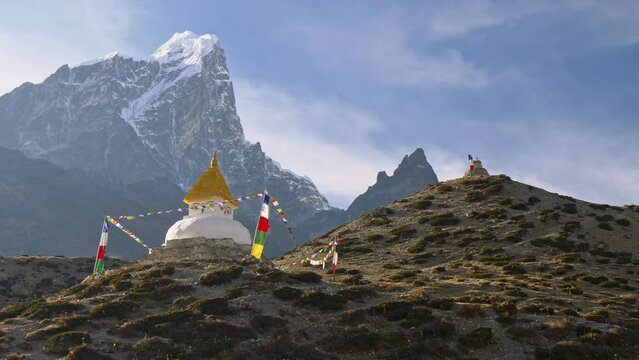 White Buddhist stupa on the way to everest base camp. Sagarmatha National Park, Nepal. UHD, 4K