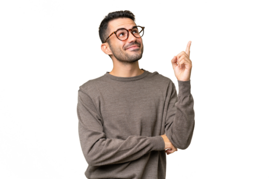 Young handsome caucasian man over isolated background pointing up a great idea