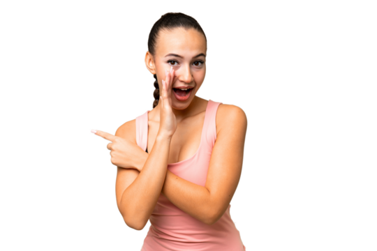 Young Arab woman over isolated background pointing to the side to present a product and whispering something