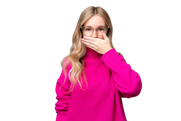 Young English woman over isolated background covering mouth with hand