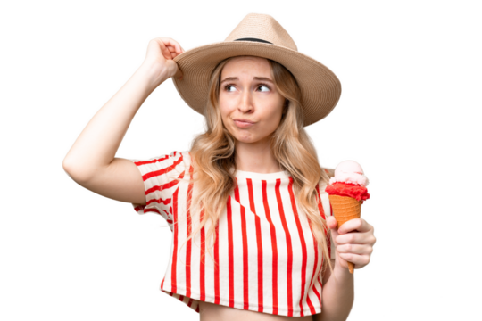 Young English woman with a cornet ice cream over isolated background having doubts and with confuse face expression