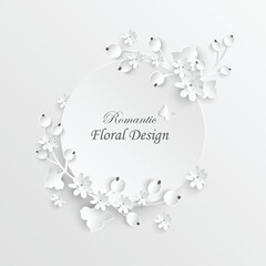 Obraz premium Paper flower. Round frame with abstract cut flowers. White rose. Wedding decorations. Decorative bridal bouquet.
