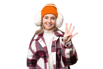 Young  English woman wearing winter muffs over isolated background happy and counting four with fingers