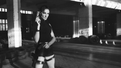 Lara Croft Tomb Raider action movie cosplay costume photoshoot with guns and weapons brunette...