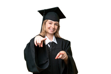 Young university English graduate woman over isolated background points finger at you while smiling
