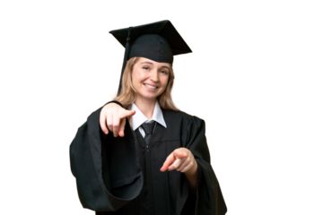 Young university English graduate woman over isolated background points finger at you while smiling