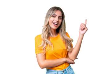 Young Uruguayan woman over isolated background happy and pointing up