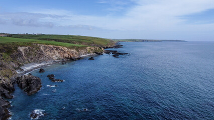 The southern coast of Ireland, top view. Blue sea space. Seascape. Drone point of view.
