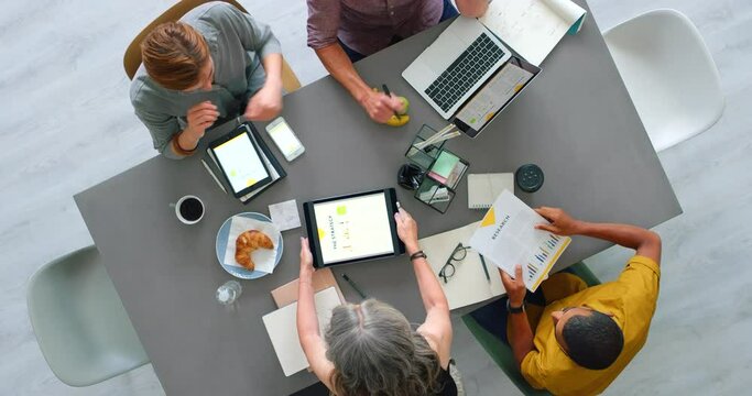 Collaboration, team and working in office top view for marketing proposal preparation together. Planning, teamwork and strategy of dedicated people busy with professional project on lunch.