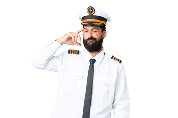 Airplane caucasian pilot man over isolated chroma key background having doubts and with confuse face expression