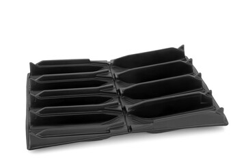 Root trainer for sowing seeds to develop root growth prior to planting. Open seedling module tray for gardening in black plastic on white background. Copy space.