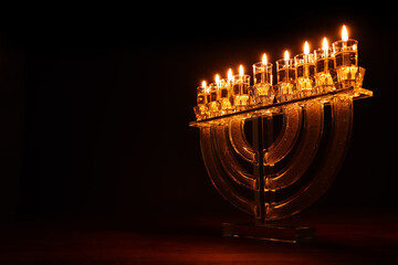 Image of jewish holiday Hanukkah with menorah (traditional candelabra) and candles