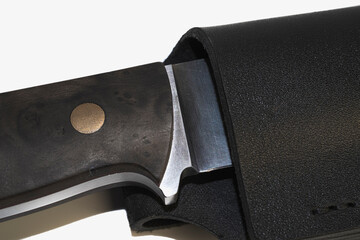 Hunting knife isolated on white background.
souvenir collectible silver dagger with a scabbard,...