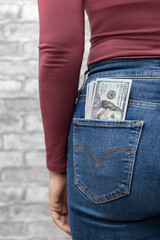Obraz na płótnie Canvas Money is in the back pocket of jeans.