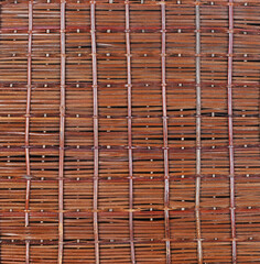  Natural brown rattan surface. Rattan furniture background. Top view, flat lay