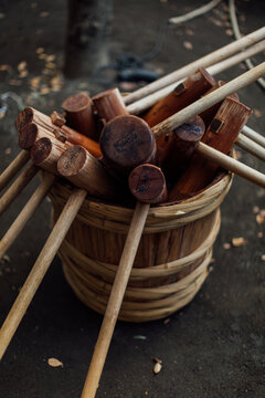 Wooden mallets, or kine (杵) used to pound rice to make mochi in mochitsuki festival in Japan.