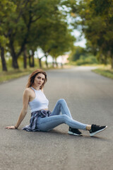 portrait of a beautiful girl on the road