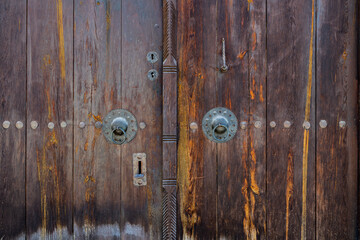 ottoman mansion door handle. wooden door and door handle of historical turkish house. Safranbolu houses door handle