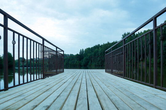 wooden bridge over the river