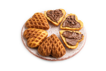 Homemade waffle with chocolate butter isolated on white. side view.