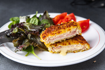 cordon blue meat cutlet chicken, ham, cheese fresh delicious snack meal food on the table copy space food background rustic top view