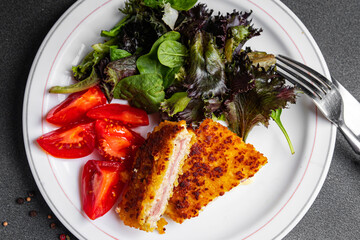 cordon blue meat cutlet chicken, ham, cheese fresh delicious snack meal food on the table copy space food background rustic top view