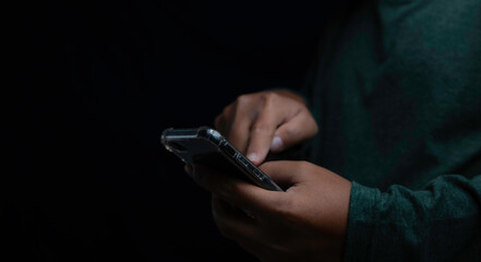 Young man using smartphone.