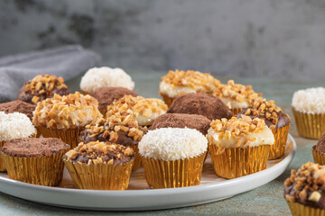 Brigadeiro is a common Brazilian dessert. Delicious chocolate candy Brigadeiro on a table