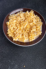 christmas shape pasta festive food spruce, star, santa, snowman delicious snack meal food snack on the table copy space food background rustic top view