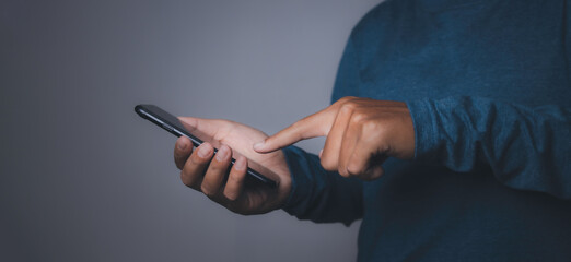 Young man using smartphone.