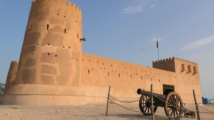 Cannon of the old castle Al Zubara Fort, a historic Qatari military fortress, Middle East, Arabian Peninsula of Persian Gulf in North of Qatar.