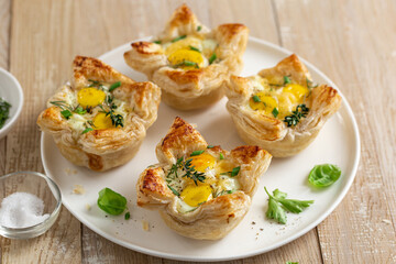 savory puff pastry cups with egg and cheese